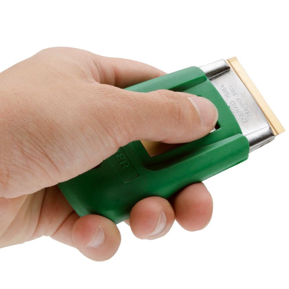 Unger ErgoTec® Safety Scraper 1.5 inch (4 cm) for professional window cleaning compact glass scraper designed for safely removing paint, stickers, and stubborn debris from windows and glass surfaces.