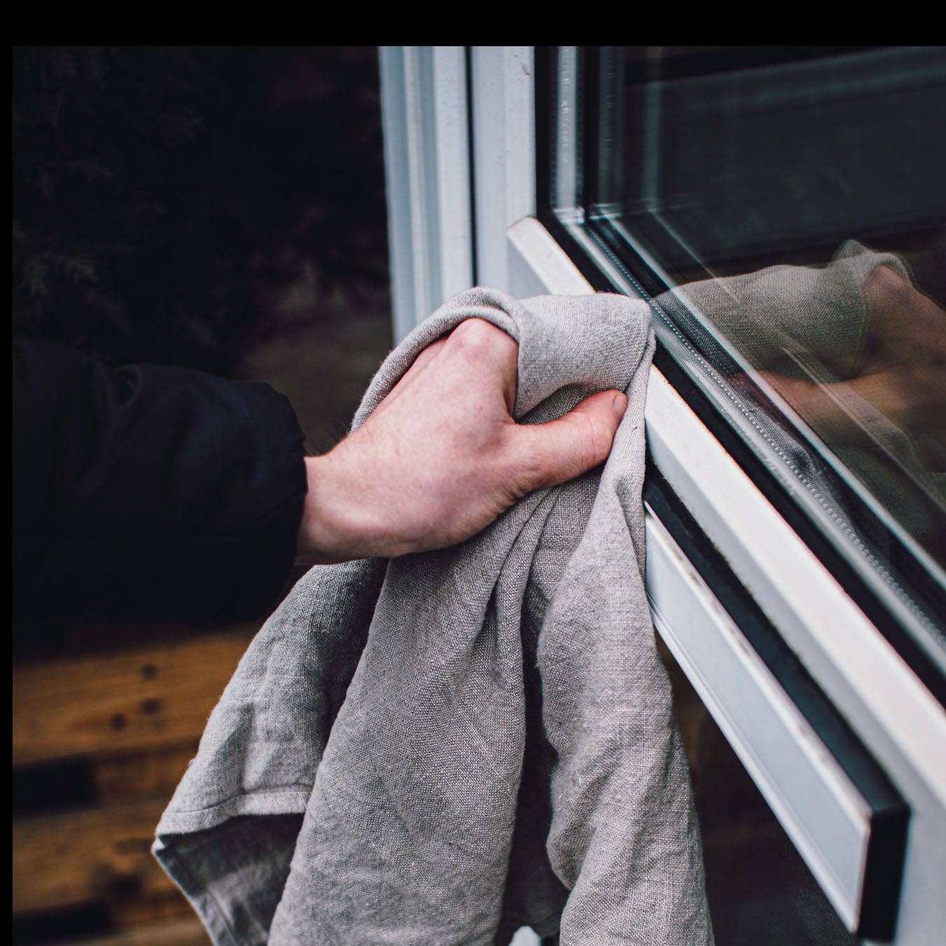 Professional Window Cleaning Scrim being used by a window cleaner